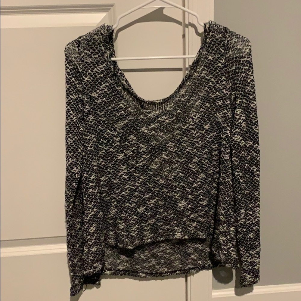 Black and white open back sweater.